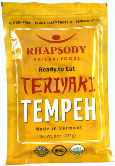 Yellow packet of ready to eat teriyaki tempeh made by Rhapsody Natural Foods